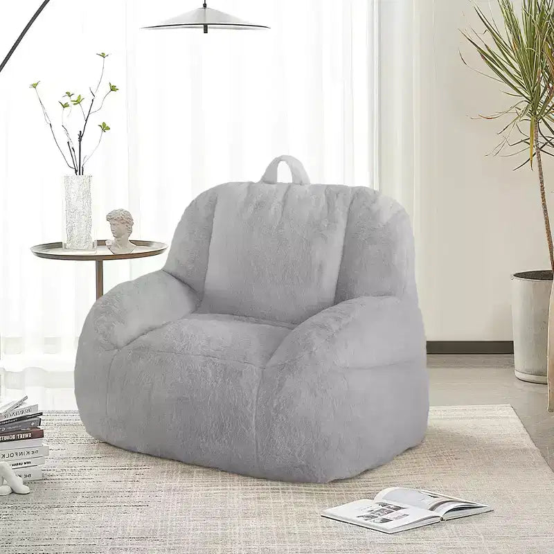 Giant faux leather beanbag sofa - adult beanbag chair with padding and handles - perfect for the living room- highly comfortable.