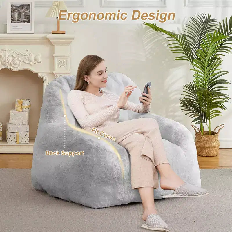 Giant faux leather beanbag sofa - adult beanbag chair with padding and handles - perfect for the living room- highly comfortable.