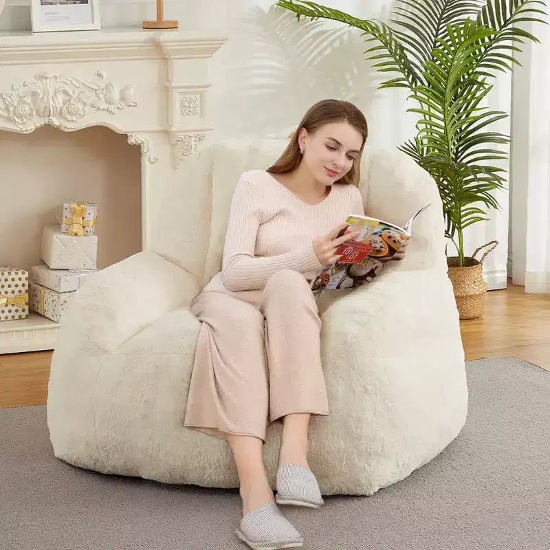 Giant faux leather beanbag sofa - adult beanbag chair with padding and handles - perfect for the living room- highly comfortable.