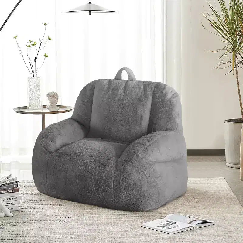 Giant faux leather beanbag sofa - adult beanbag chair with padding and handles - perfect for the living room- highly comfortable.