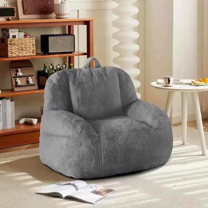 Giant faux leather beanbag sofa - adult beanbag chair with padding and handles - perfect for the living room- highly comfortable.