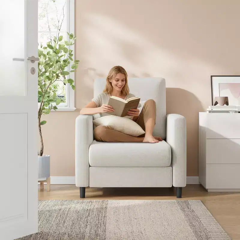 Lounge Sofa  A modern single upholstered chair suitable for living room or bedroom, featuring a mid-century wooden frame, comfortable and compact.
