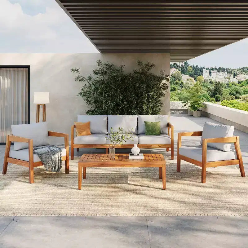 Juego de asientos de patio moderno Phachara de 4 piezas de madera de acacia Christopher Knight Home con cojines y mesa de listones