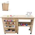 Folding Sewing Table, Multipurpose Sewing Machine Table with Compact Design, Wheels, Shelves, Storage Trays, Wooden Pegs, and Magnetic Doors