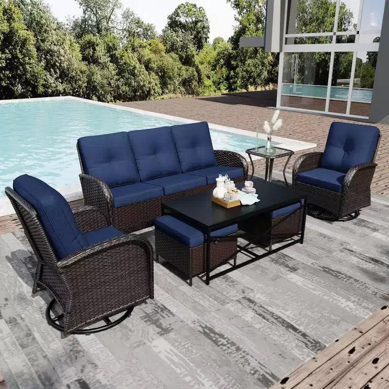 Conjunto de patio exterior de 7 piezas UPTIOT con sofá de 3 asientos, dos sillones giratorios, otomanas, mesa de centro y mesas auxiliares