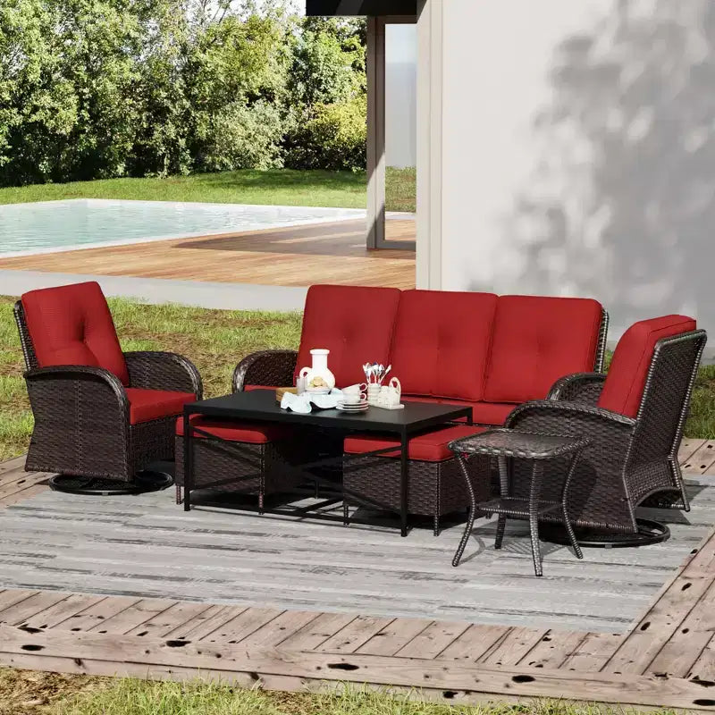 Conjunto de patio exterior de 7 piezas UPTIOT con sofá de 3 asientos, dos sillones giratorios, otomanas, mesa de centro y mesas auxiliares