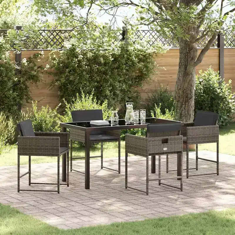 vidaXL Conjunto de comedor de jardín con cojín 5 pzas Ratán PE gris