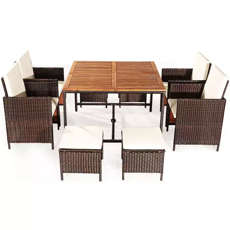 Juego de comedor de patio de ratán de madera de acacia Costway de 9 piezas con sillas acolchadas y otomanas