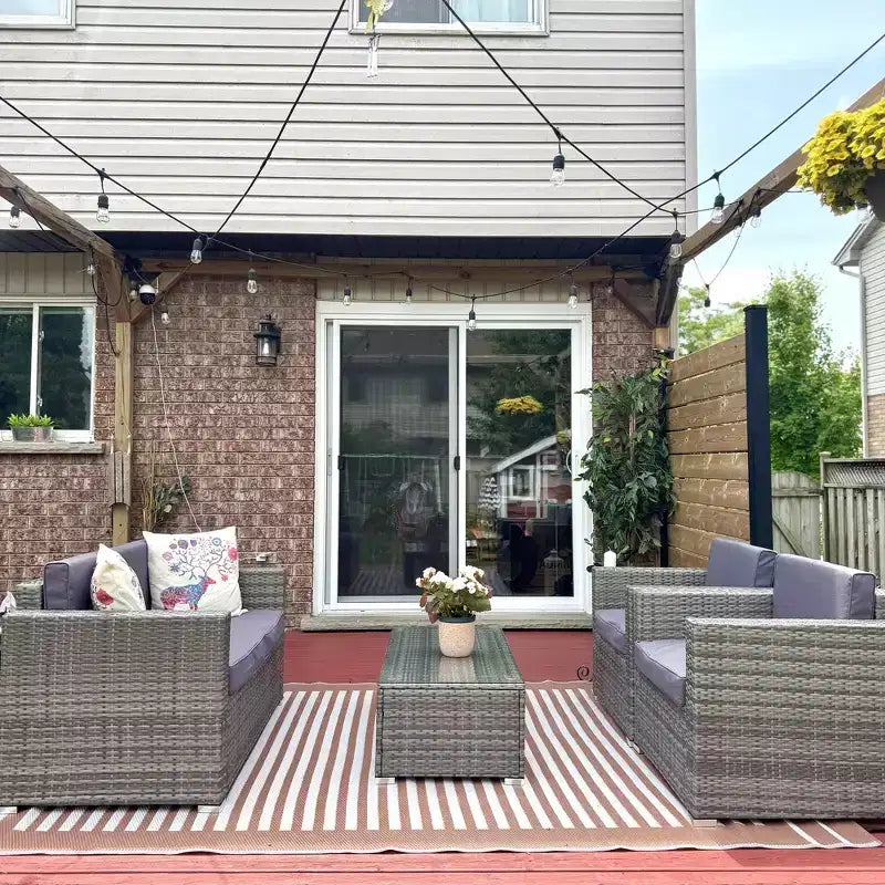 Conjunto de muebles de mimbre de ratán Outsunny de 4 piezas, muebles de conversación acolchados para exteriores con 2 sillas, sofá de dos plazas y mesa de centro de cristal