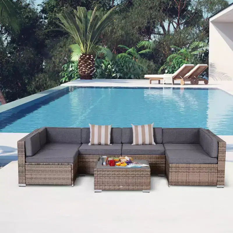 Juego de Muebles de Patio Outsunny de 7 Piezas, Juego de Conversación de Ratán para Exteriores, Sofá Seccional de Ratán PE para Todo Clima con Mesa de Madera Sintética, Cojines de Rayas