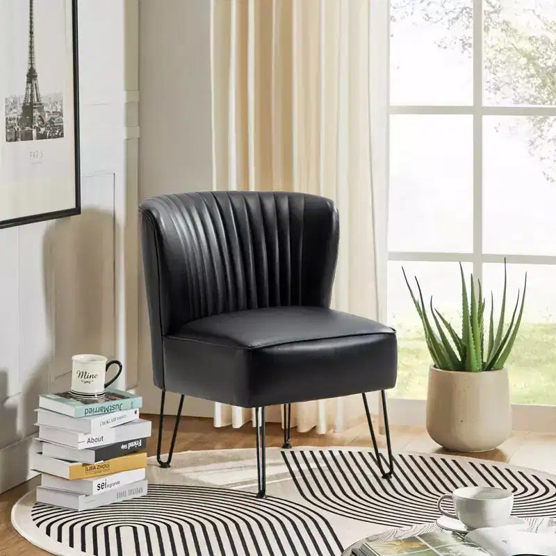 Sillón auxiliar contemporáneo de cuero vegano capitoné con patas de metal en forma de U