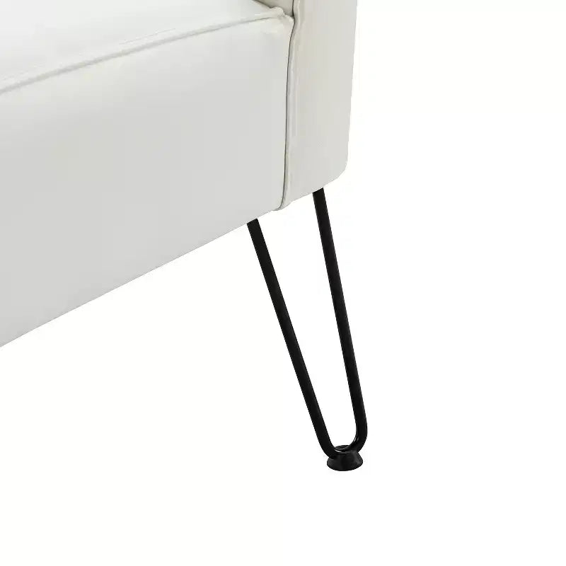 Sillón auxiliar contemporáneo de cuero vegano capitoné con patas de metal en forma de U