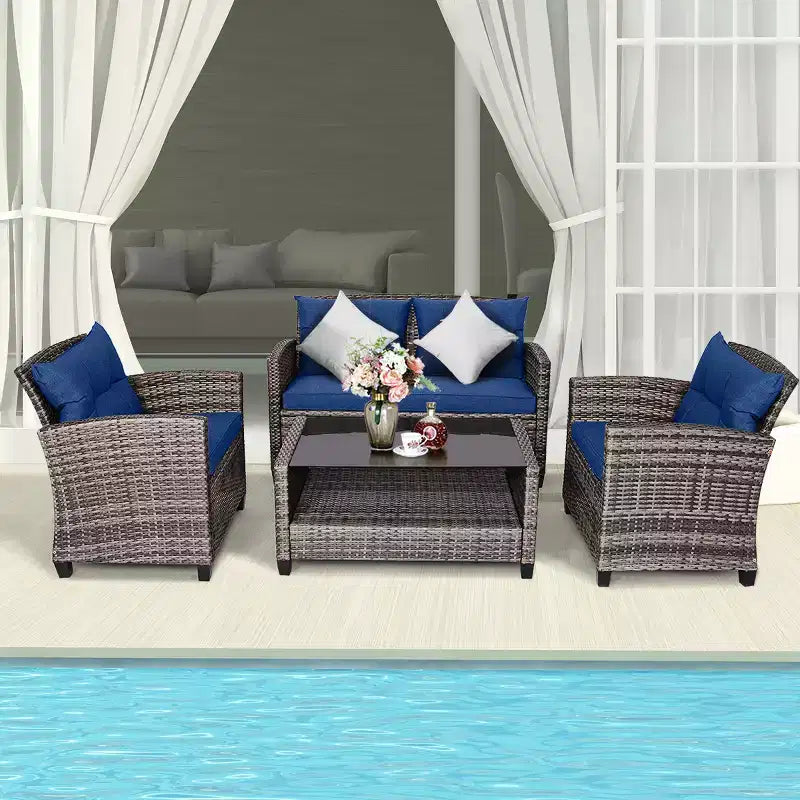 Juego de Muebles de Patio de Ratán de Costway 4 Piezas/8 Piezas Mesa de Centro Sofá Acolchado Jardín Césped Azul Marino