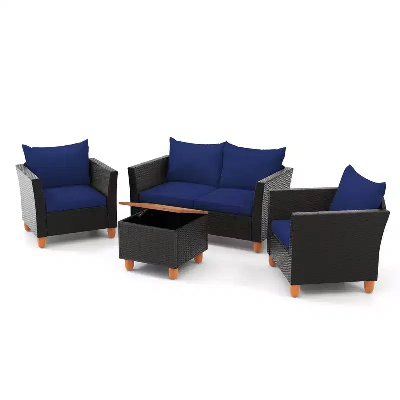Juego de muebles de patio de mimbre Costway de 4 piezas con cojines extraíbles, mesa de centro de almacenamiento, blanco/azul marino/gris