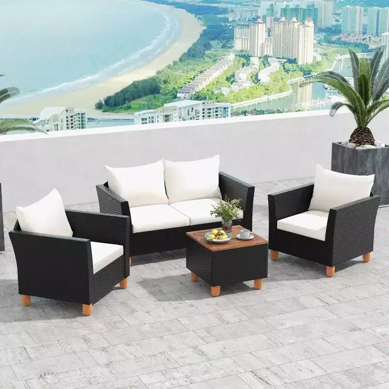 Juego de muebles de patio de mimbre Costway de 4 piezas con cojines extraíbles, mesa de centro de almacenamiento, blanco/azul marino/gris