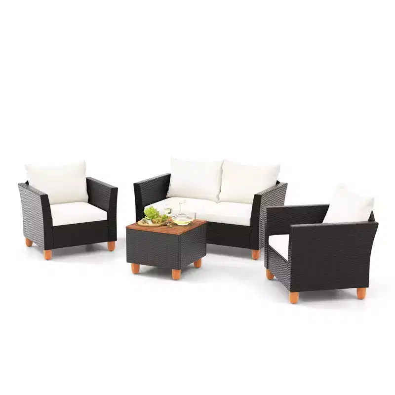 Juego de muebles de patio de mimbre Costway de 4 piezas con cojines extraíbles, mesa de centro de almacenamiento, blanco/azul marino/gris